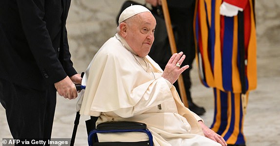 (FILES) Pope Francis arrives for the weekly general audience at Paul-VI hall in The Vatican on February 5, 2025. Pope Francis "slept all night long" the Vatican said on March 4, 2025 after he suffered two breathing attacks on Monday, as the 88-year-old pontiff struggles to recover from pneumonia. (Photo by Alberto PIZZOLI / AFP) (Photo by ALBERTO PIZZOLI/AFP via Getty Images)