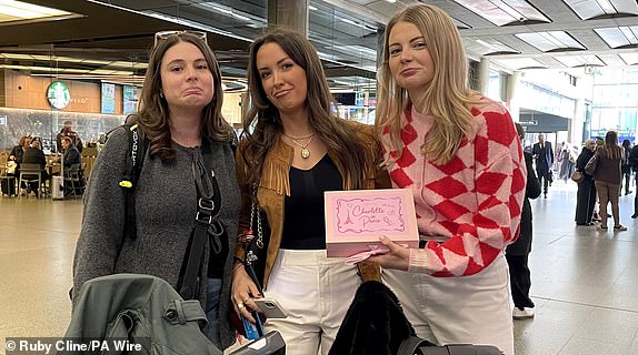 (left to right) Ruby Mowle, Francesca Birch, and Charlotte Liddell, passengers at St Pancras International station in London, pose for a photo after Eurostar trains to the capital have been halted following the discovery of an unexploded Second World War bomb near the tracks in Paris. Picture date: Friday March 7, 2025. PA Photo. See PA story RAIL Eurostar. Photo credit should read: Ruby Cline/PA Wire