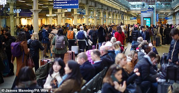 Passengers at St Pancras International station in London, after Eurostar trains to the capital have been halted following the discovery of an unexploded Second World War bomb near the tracks in Paris. Picture date: Friday March 7, 2025. PA Photo. See PA story RAIL Eurostar. Photo credit should read: James Manning/PA Wire