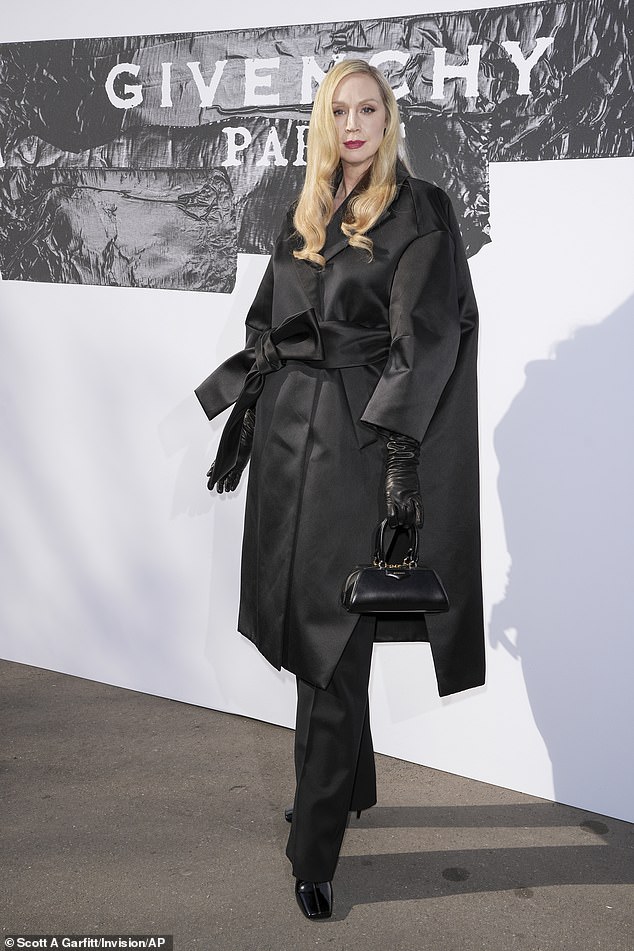 Elsewhere, Game Of Thrones actress Gwendoline made sure to turn heads as she stuck to the all-black theme in a silky oversized trench coat, complete with a large bow detail