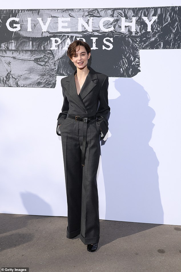 Spanish actress Saura Lightfoot-Leon nailed her look as she posed in a figure-hugging grey suit, complete with a black belt