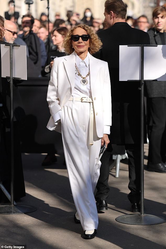 Meanwhile, former model Marisa Berenson cut an elegant figure in an all-white suit complete with a belt and a gold statement necklace