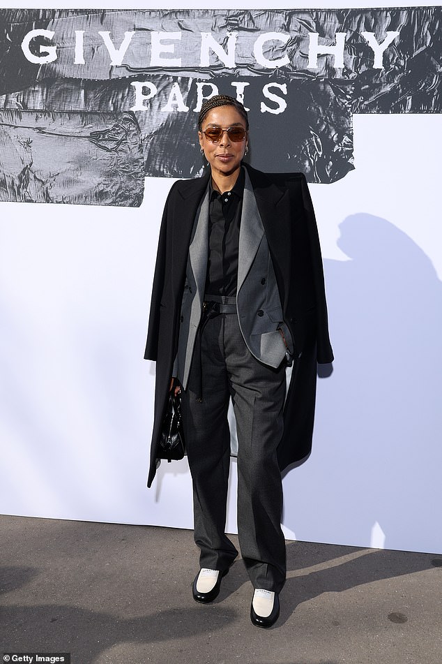 British actress and singer Sophie Okenedo also nailed office chic in a grey suit paired with a long black trench coat.