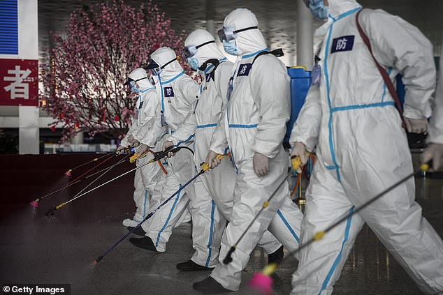 Firefighters disinfect the Wuhan Tianhe International Airport on April 3, 2020 in Wuhan, Hubei Province