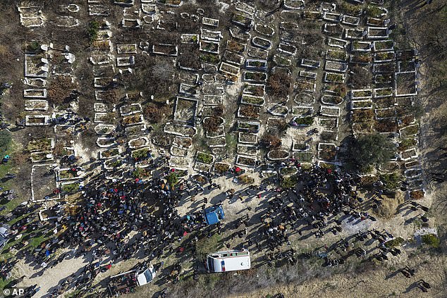 Relatives and neighbours attend the funeral procession for four Syrian security force members killed in clashes with loyalists of ousted President Bashar Assad in coastal Syria