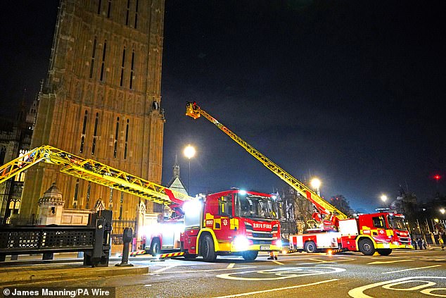 Rescuers used a cherry-picker to reach the individual, who had been perched on the stone ledge of the tower