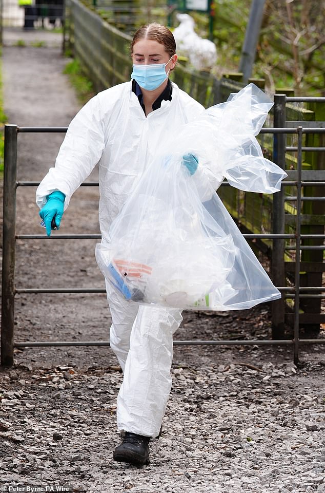 It was immediately obvious that the body part belonged to a man who had been 'sawn into pieces', according to the prosecution (Pictured: Forensic officers at Kersal Dale)