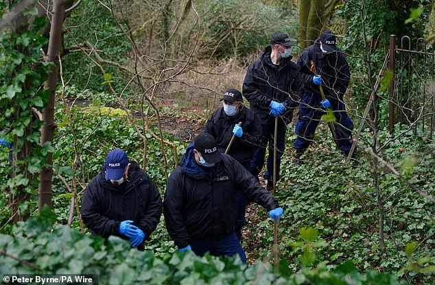 Police found a further 26 parts of his body at four other locations (Pictured: Police carry out searches)