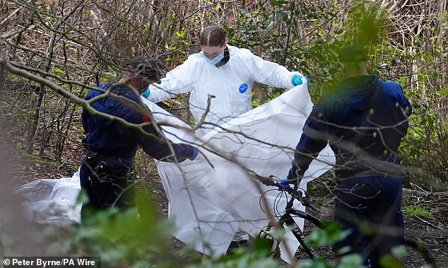 His lower torso and thighs were found in one piece by members of the public who informed police, however at that stage his identity was unknown (Pictured: Police and forensics)