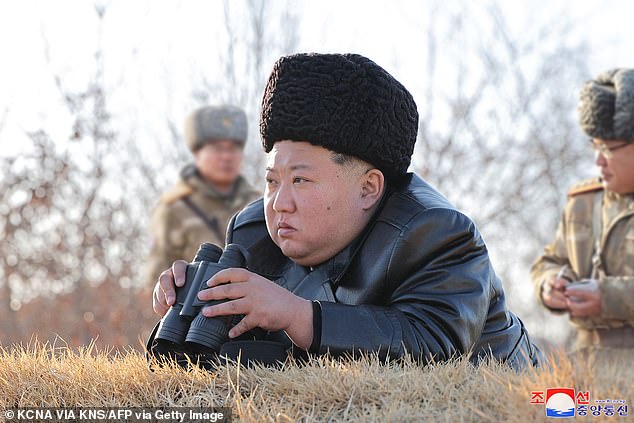 North Korea's leader Kim Jong Un observing the launch of a strategic cruise missile during a drill by the Korean People's Army on February 28