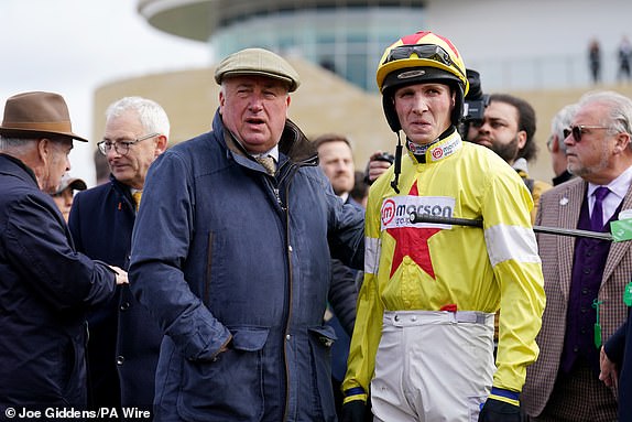 Trainer Paul Nicholls (left) and Jockey Harry Cobden on day three of the 2025 Cheltenham Festival at Cheltenham Racecourse. Picture date: Thursday March 13, 2025. PA Photo. See PA story RACING Cheltenham. Photo credit should read: Joe Giddens/PA Wire.RESTRICTIONS: Use subject to restrictions. Editorial use only, no commercial use without prior consent from rights holder.