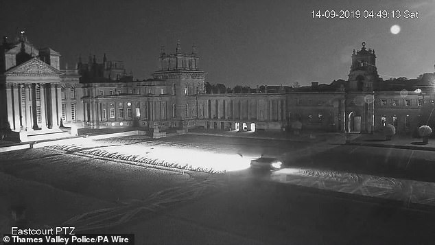 Screen grab from CCTV dated September 14, 2019 issued by police showing two vehicles drivingthrough the main gate to the entrance in the courtyard at the front of Blenheim Palace