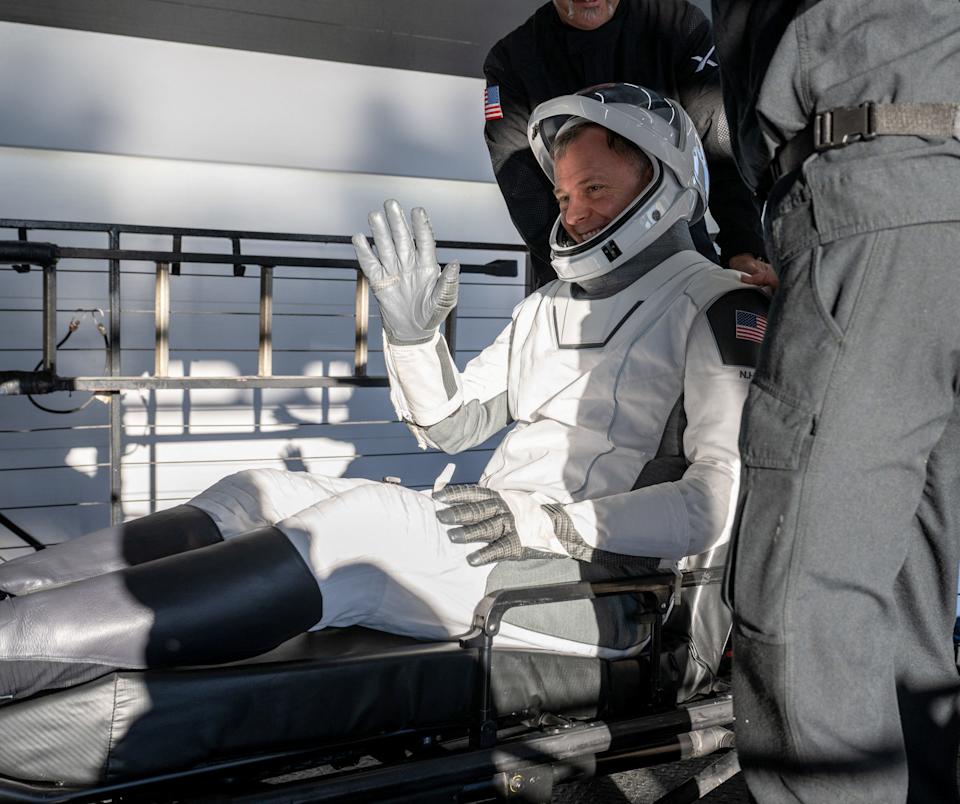 NASA astronaut Nick Hague is helped out of the SpaceX Dragon Freedom capsule onboard the SpaceX recovery ship MEGAN after he, NASA astronauts Suni Williams, Butch Wilmore, and Roscosmos cosmonaut Aleksandr Gorbunov returned Tuesday from the International Space Station.