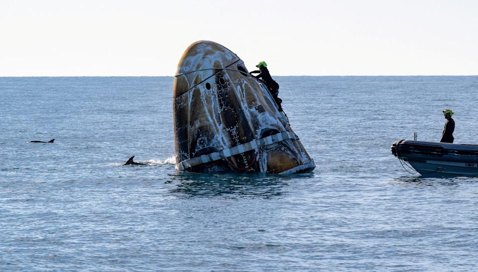 The SpaceX Dragon spacecraft floats off the coast of Florida as support teams work to recover the vehicle. NASA astronauts Nick Hague, Suni Williams, Butch Wilmore, and Roscosmos cosmonaut Aleksandr Gorbunov returned on the capsule Tuesday evening after departing the International Space Station.