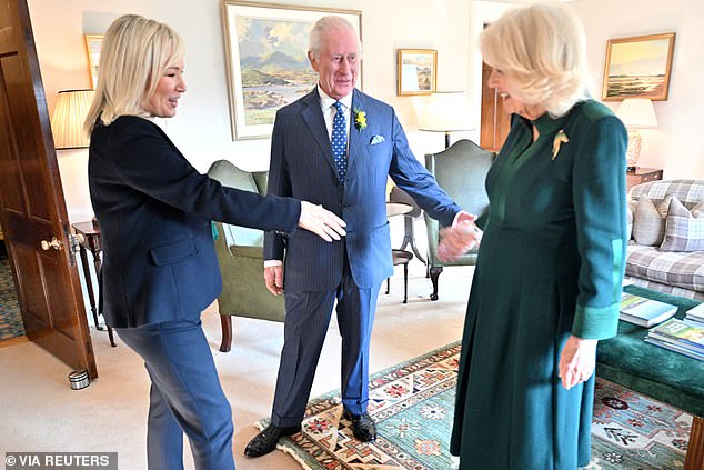 Charles and Camilla pictured shaking hands with Michelle O'Neill, First Minister of Northern Ireland at Hillsborough Castle