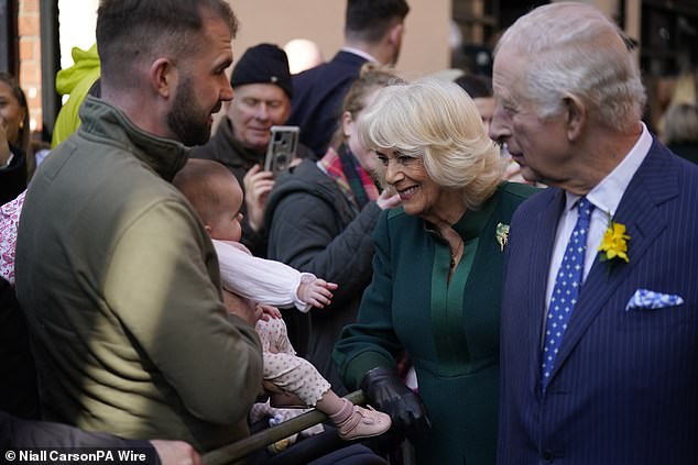 The royal couple beamed as they stopped to chat with members of the public