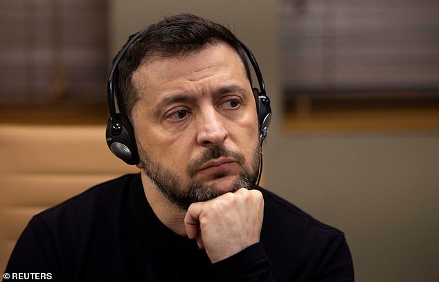 Ukrainian President Volodymyr Zelensky listens to questions during a meeting with members of the media on the outskirts of London, Britain, March 2, 2025