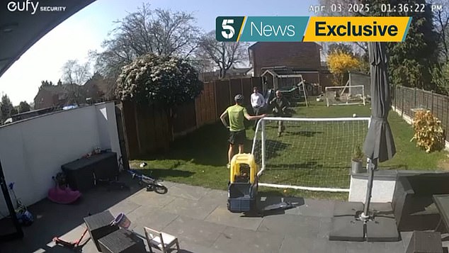 Falconer Alan Greenhaigh can be seen holding the hawk after retrieving it from the cage