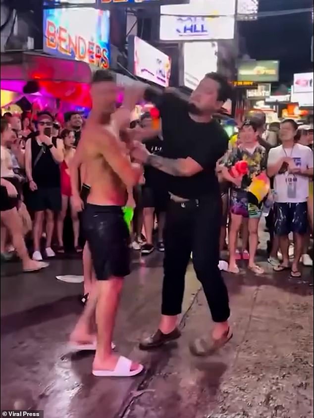 The foreign tourist was taken down with a single punch as huge crowds watched on