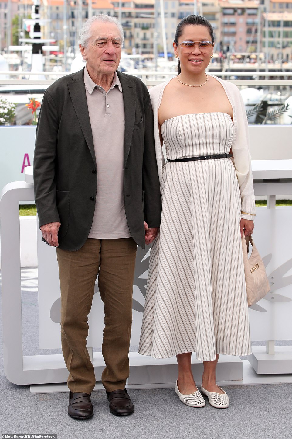 Honouree himself De Niro - who attended with his partner Tiffany Chen - was spotted at the photo call celebrating him