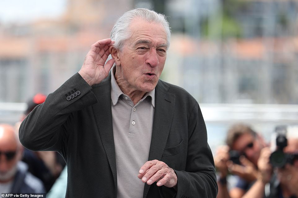 De Niro playfully joked with fans as they seemed to chant his name during the photocall in Cannes