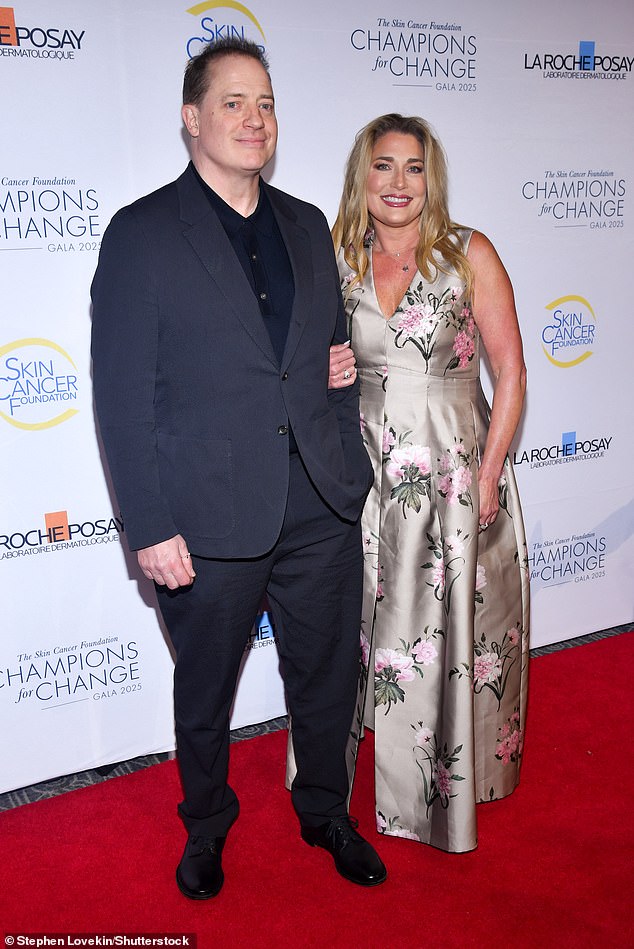 Jeanne, who is a celebrity makeup artist for the likes of Paula Abdul and Marie Osmond, exuded elegance in a silk lowcut gown covered in a pink floral pattern