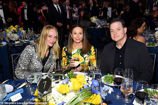 The actor added a button-up shirt underneath and smart black dress shoes as he mingled with fellow acting legends, Uma Thurman and Diane Lane (pictured)