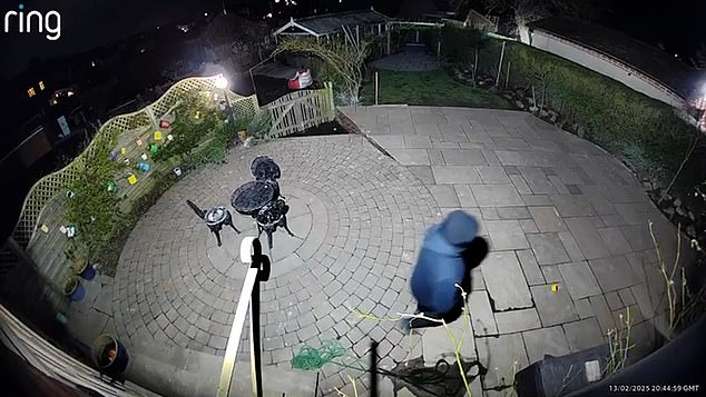 CCTV shows the intruder go in to Ms Hunt's home in Featherstone, Yorkshire, to get the dogs
