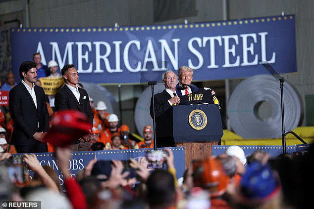 President Donald Trump (right) was gifted a Trump 47 Pittsburgh Steelers jersey by a group of current and former Steelers including (from left) Mason Rudolph, Miles Killebrew and Rocky Bleier