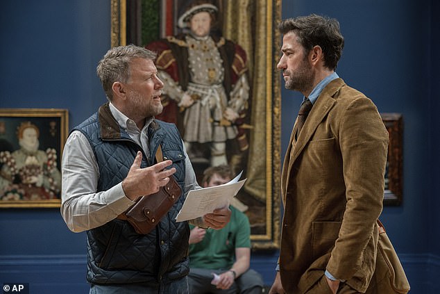The film seems designed to do well for the algorithm - rather than stretch or challenge audiences. Pictured: Guy Ritchie directing John in the film