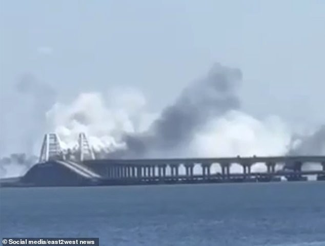 Smoke is billowing over the Russia's Kerch Bridge to Crimea - as the Kremlin claims to have shot down two Ukrainian missiles aimed at the crucial link to the annexed peninsula, August 2023