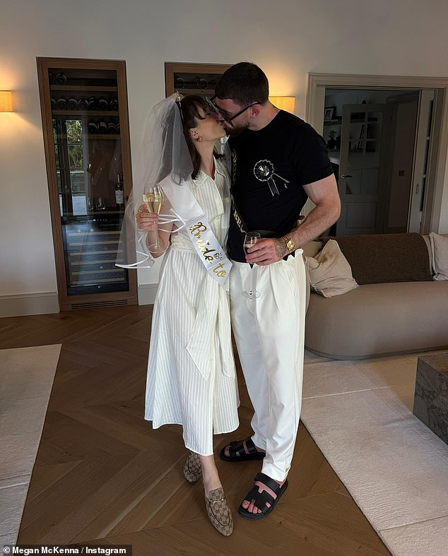 Megan wore a chic white shirt dress, complete with a veil and a bride-to-be sash
