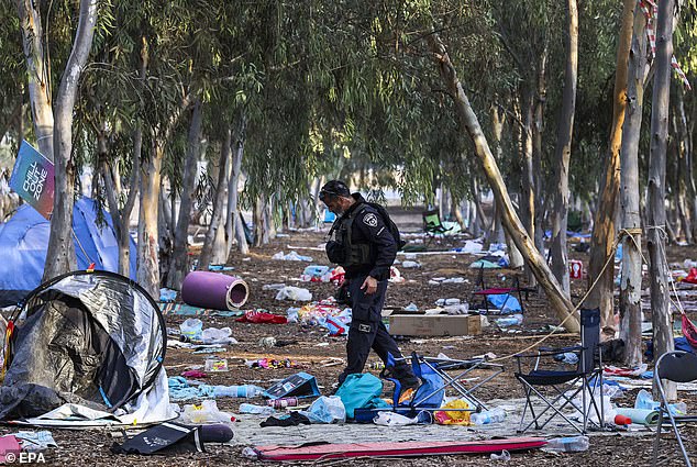 An Israeli officer at the Super Nova Festival in Re'im, Israel, after it was attacked by Hamas on October 7, 2023