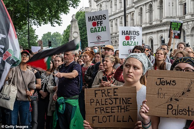 Protestors demonstrate in support of the Freedom Flotilla opposite Downing Street on June 9, 2025