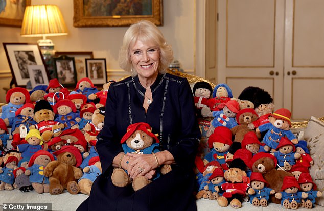 The 65-year-old lived there with his mum Shirley, who created the world's first 'plush' Paddington Bear. Above, Queen Camilla pictured in 2022 with the bears to be donated to a children's charity