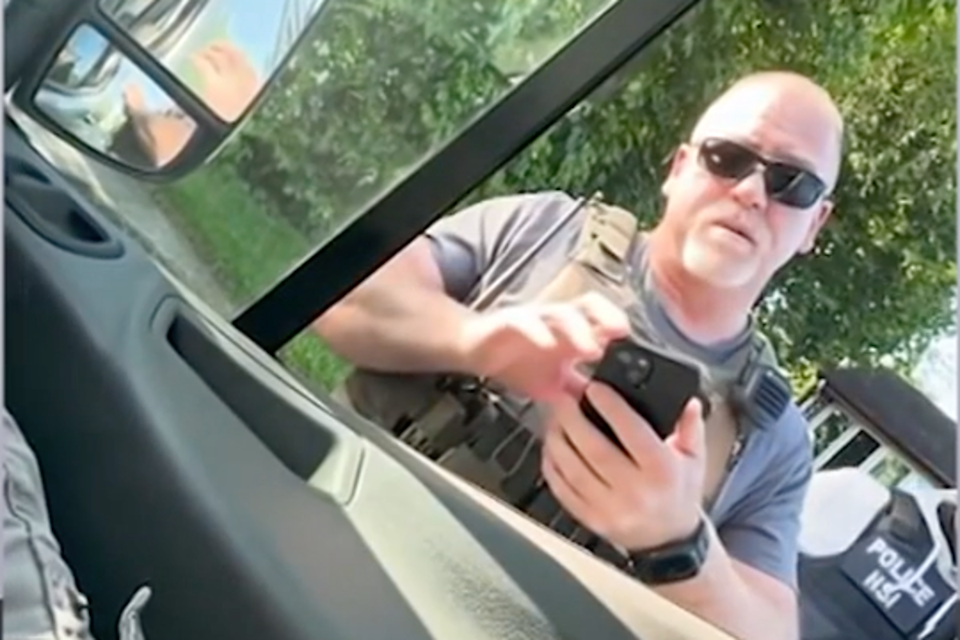 An ICE agent demanding that Elzon Lemus, a 23-year-old electrician in New York and a U.S. citizen, show his ID because he