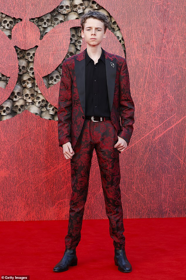 The two leading stars were also joined on the red carpet by Alfie Williams, who plays their son in the film, with the Newcastle-born star opting for a sharp red and black paisley suit