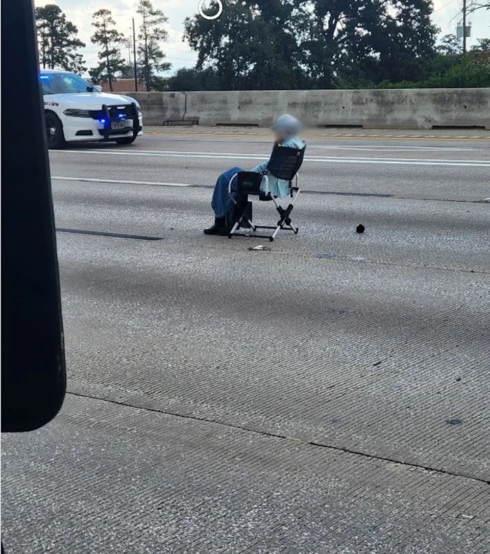 Harris County Constable Precinct 4 - PHOTO: Police released a photo showing a standoff with a woman they say is armed on a highway in Houston, June 26, 2025.