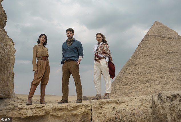Fountain Of Youth (pictured), which was released on Apple TV+ on Friday, stars John Krasinski (centre) and Natalie Portman (right, with Eiza Gonzalez, left) as estranged siblings who team up to find the titular mythical spring