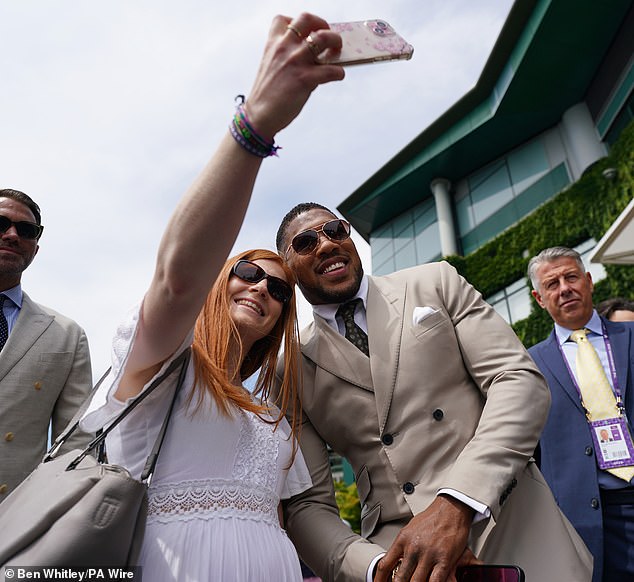 Anthony posed for selfies with the crowd as he made his way to centre court