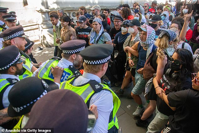 Police outside the Royal Courts of Justice as Palestine Action group is banned