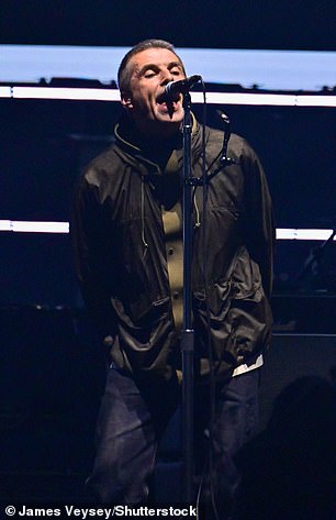 Noel arrived with his guitar, while Liam had a tambourine hanging from his teeth