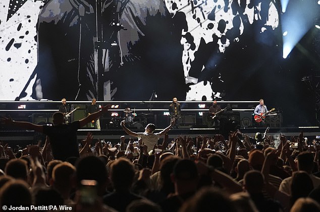 Fans climbed onto each others shoulders to get a better view of the stage