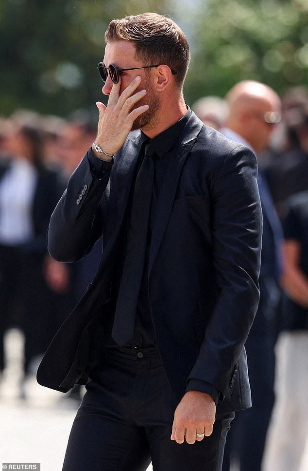 Former Liverpool Captain Jordan Henderson wiped tears as he paid his respects to his former team mate