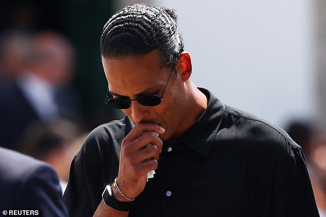 Van Dijk was visibly emotional as he hid his eyes behind dark sunglasses and sobbed in to a tissue