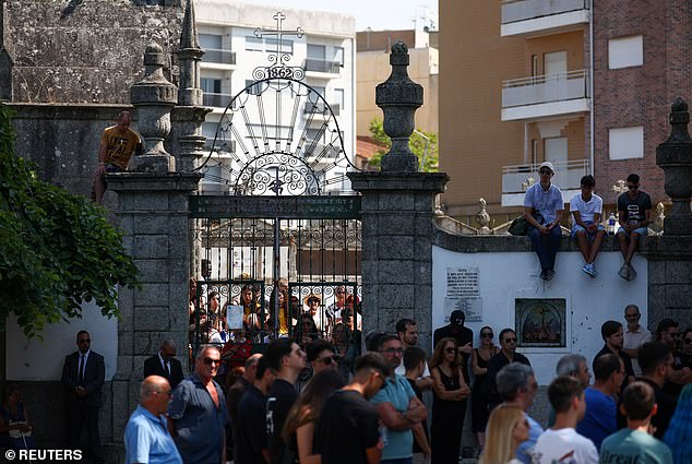 Mourners gathered outside the Chapel of the Resurrection, on the day of Jota and his brother Andre's funeral ceremony