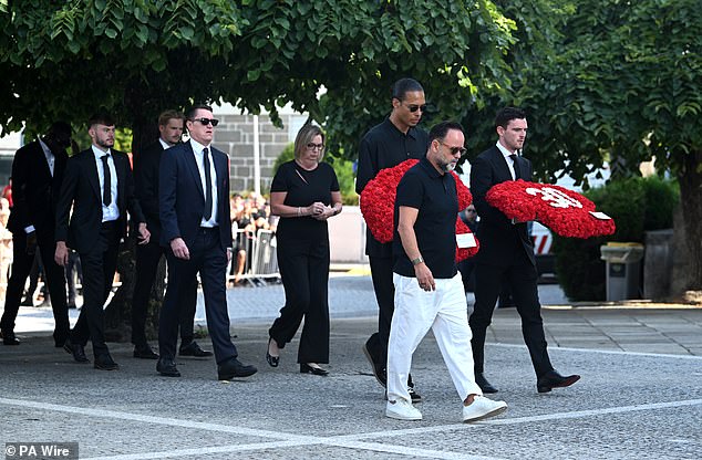 Liverpool's Virgil Van Dijk and Andy Robertson arriving at the funeral of Diogo Jota and Andre Silva
