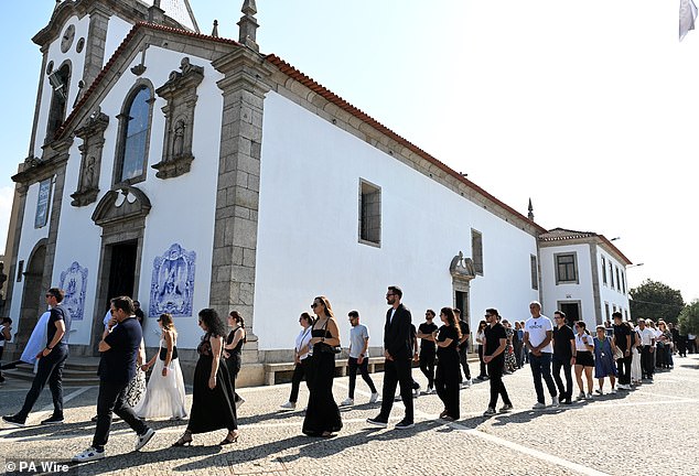 Mourners at the funeral of Diogo Jota and Andre Silva make their way into the Igreja Matriz de Gondomar in the town of Gondoma to start the funeral service