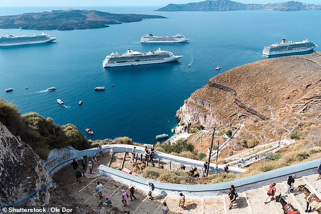 Pictured: A coastal path in Santorini before the tourism surge