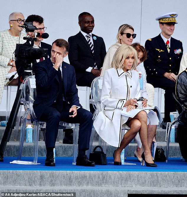 Emmanuel Macron and Brigitte Macron during a parade of foot troops on the Champs Elysées on the occasion of the National Day of July 14